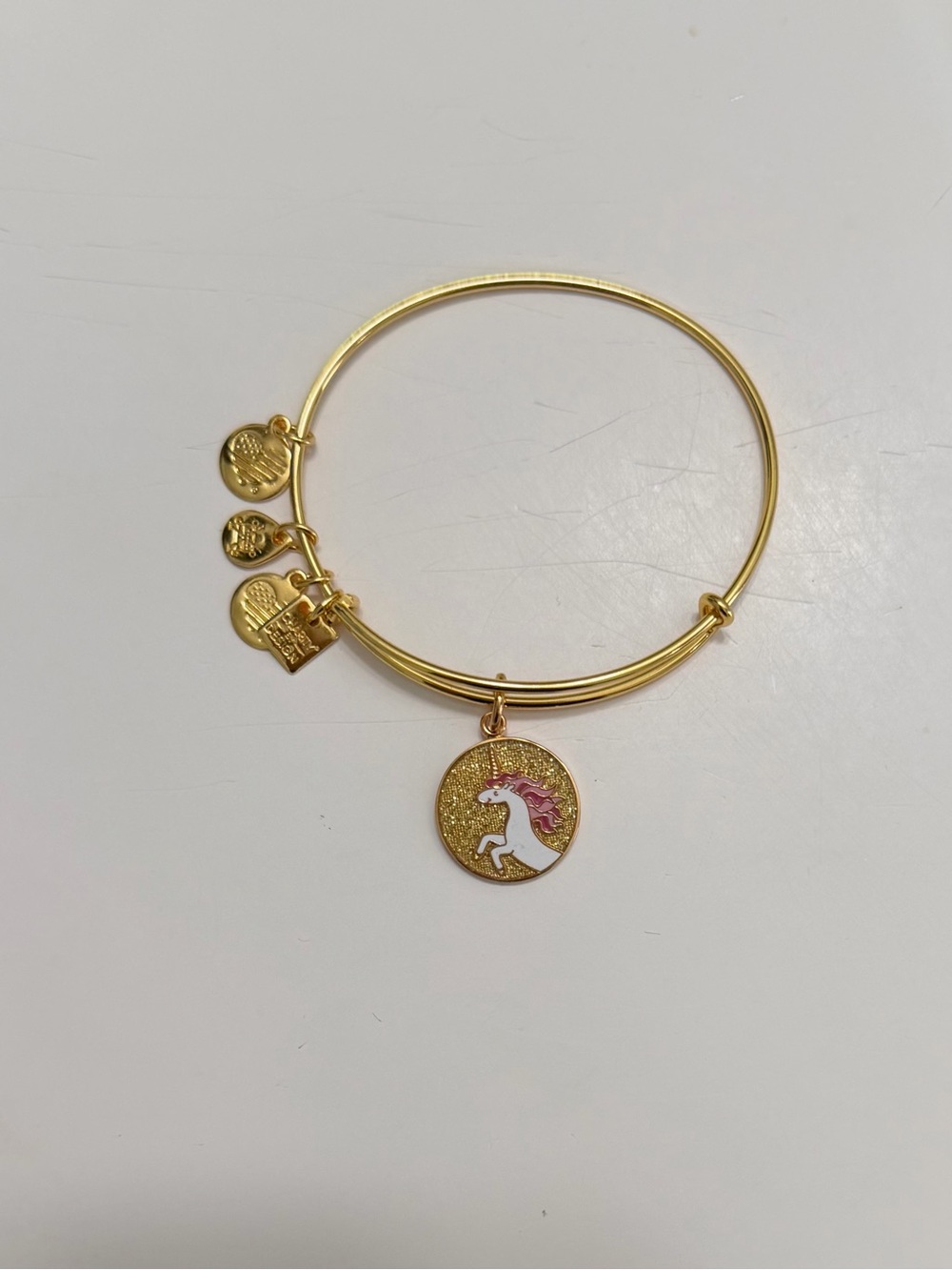 Alex and Ani Gold Bangle with White and Pink Unicorn Charm